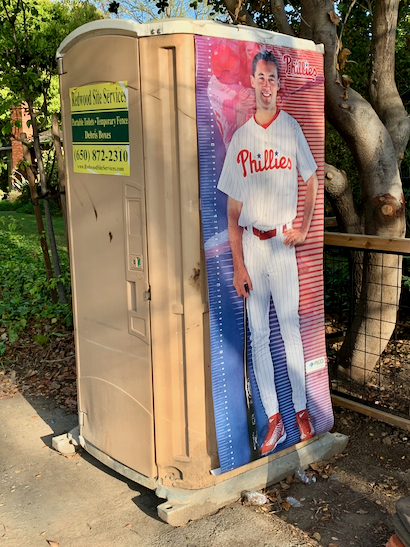 Neighborhood walking: What is a photo of Pat Burrell doing on a porta potty?