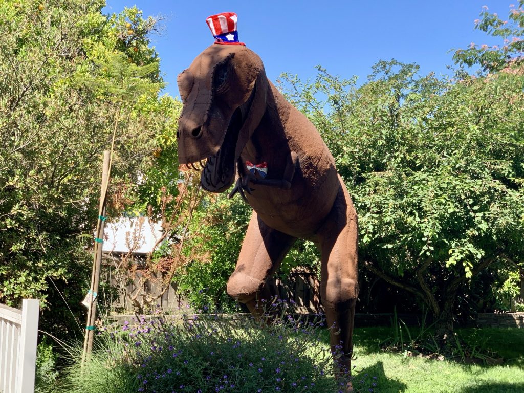 Spotted: Big dino with little 4th of July hat