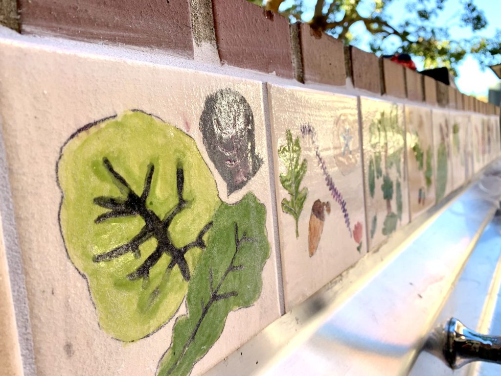 Sacred Heart Schools third graders honor Native land with nature tile project