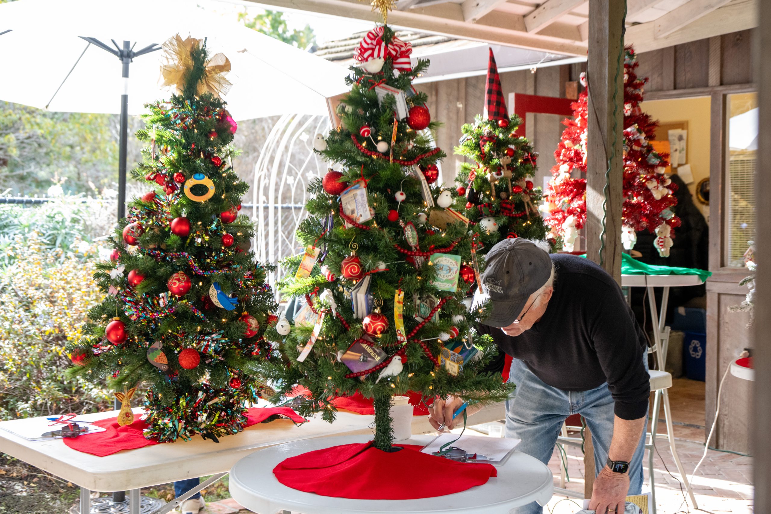 bidding on Christmas trees at Allied Arts Guild