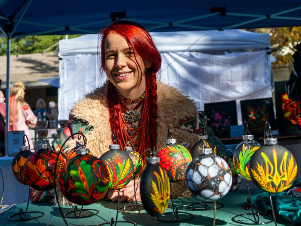 Colorful clothing, colorful wares being sold at Ukrainian Christmas festival