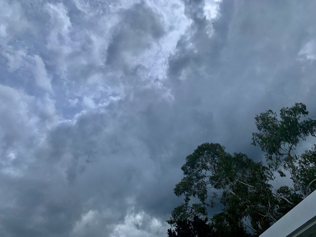 Dark clouds yield no rain this afternoon in Menlo Park
