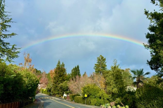 Big rainfall followed by rainbow over the Peninsula