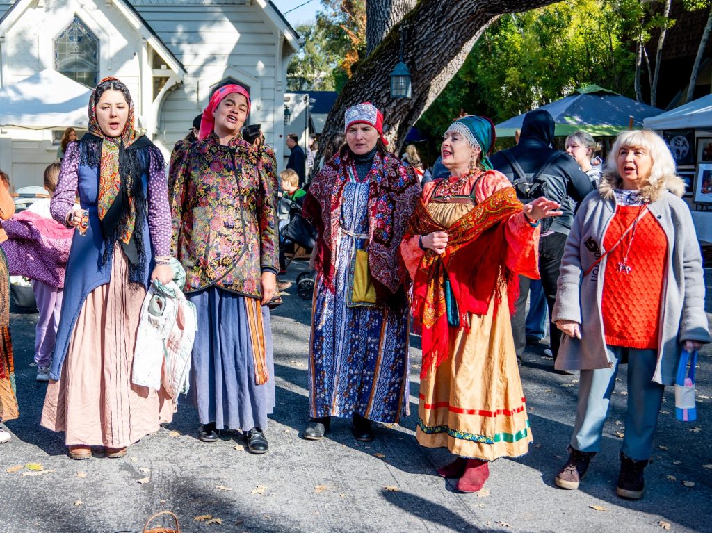 Spotted: Colorful costumes and church interior at Christmas Festival