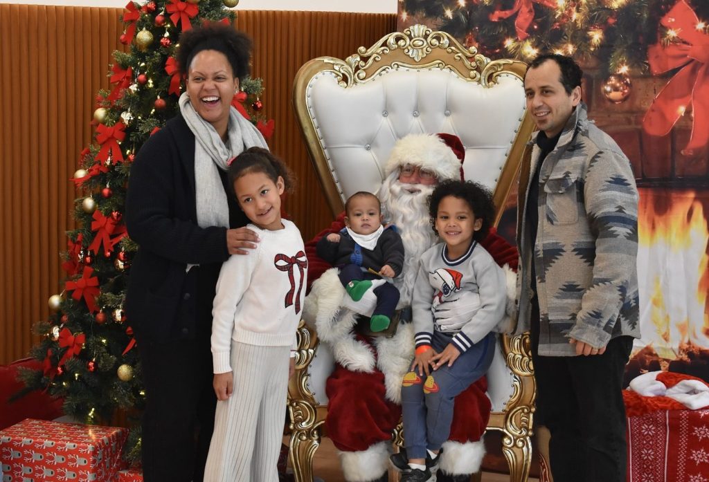 Menlo Park community enjoys visiting with Santa along with Santa’s breakfast table