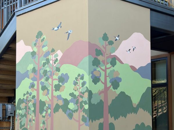 Artist Flo deBretagne works with residents at Willow Commons on three new murals