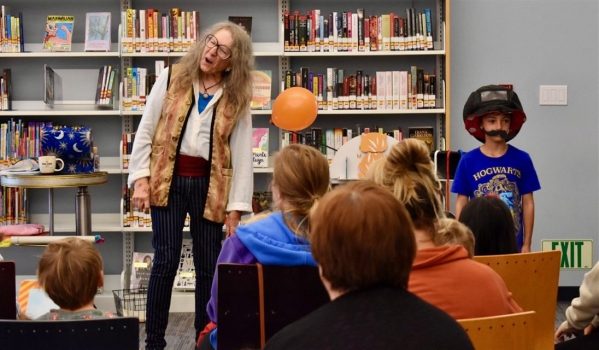 Blake Maxam performs “The Magic of Ahs!” at the Belle Haven Library on June 7