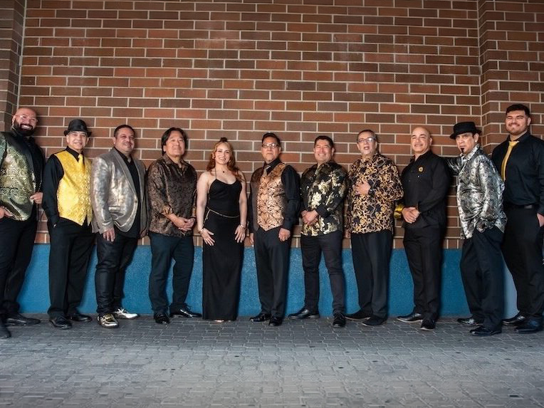 Patrón Latin Rhythms band appears at Karl E. Clark Park on July 31